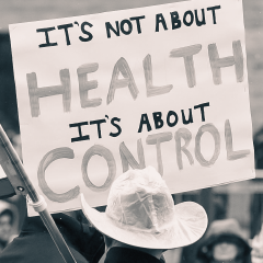 Words on sign 'It's not about health, it's about control'